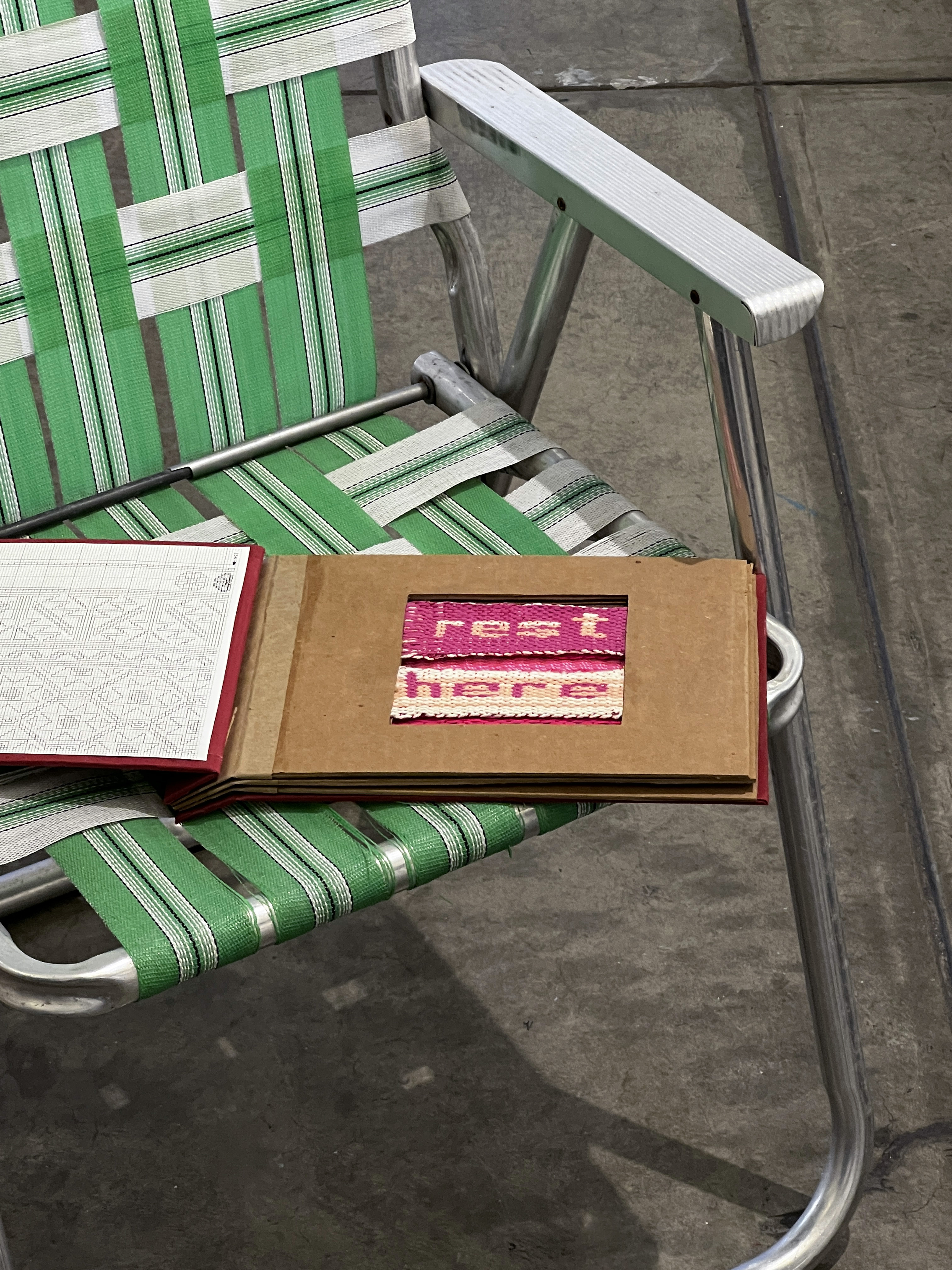 rest here — woven sample book on a lawn chair